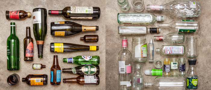 Ett kollage med utlagda färgade-och ofärgade öl-, vin- och andra flaskor