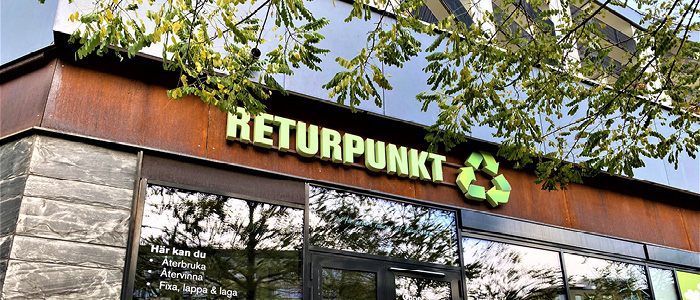 Foto taget Returpunktens logga i Sundbyberg